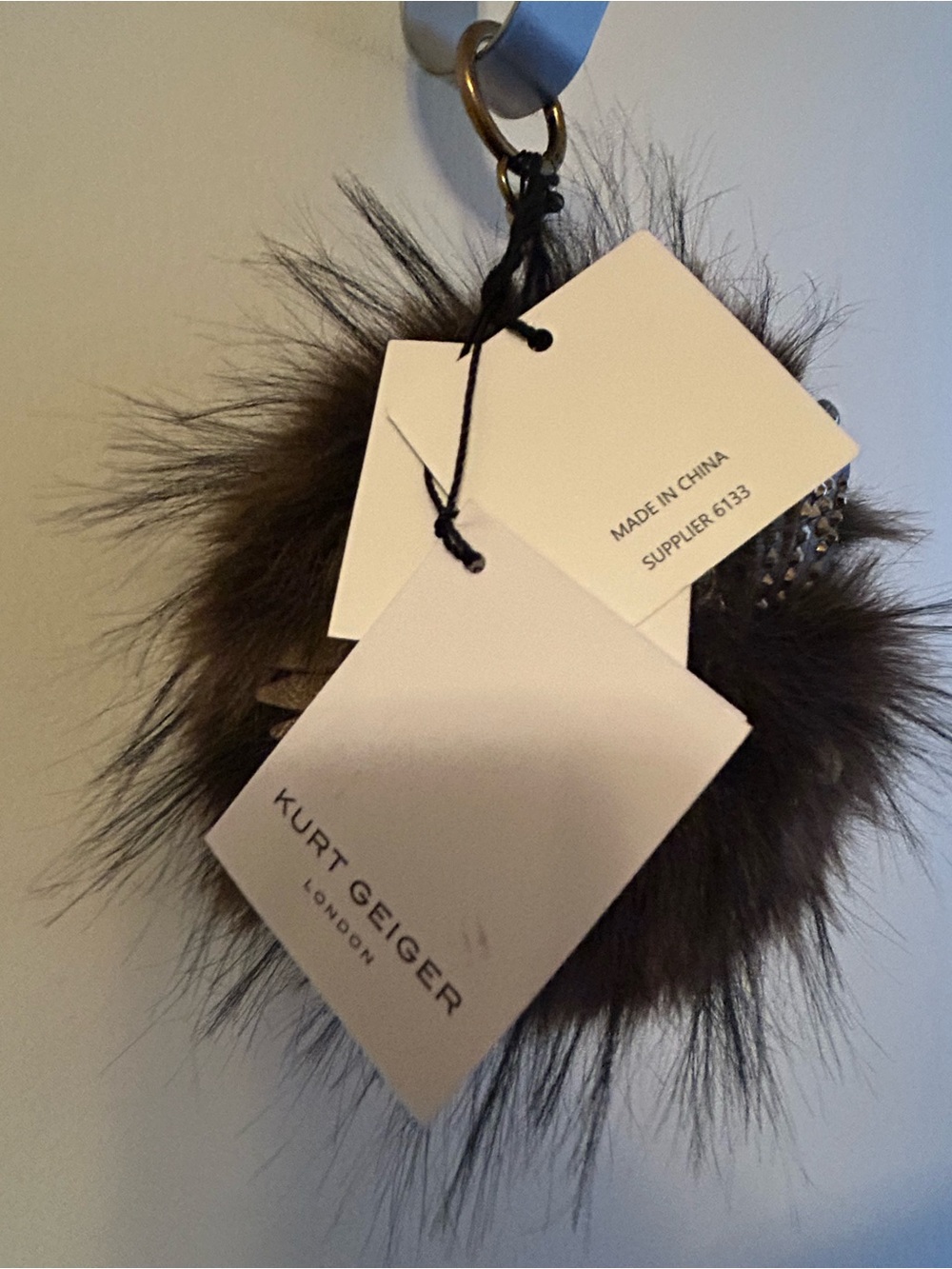 Kurt Geiger Brown Furry Pom-Pom Keychain with Gold-Tone Crystal Accents - Picture 4 of 12